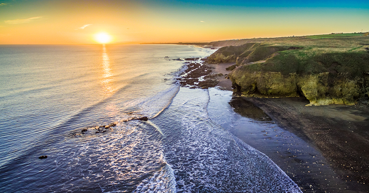 Blackhall Rocks Beach and the North Sea aerial view from a drone.